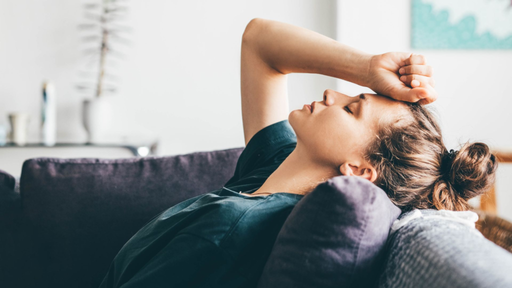 Woman in survival mode dealing with emotional exhaustion, life pressure, and responsibilities while staying strong